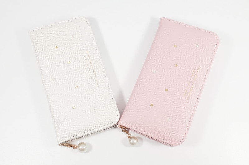 au +1 collection iPhone 8 パールチャーム付きブックタイプケース
